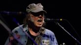 Neil Young reunites with Crazy Horse after a decade, performs double encore