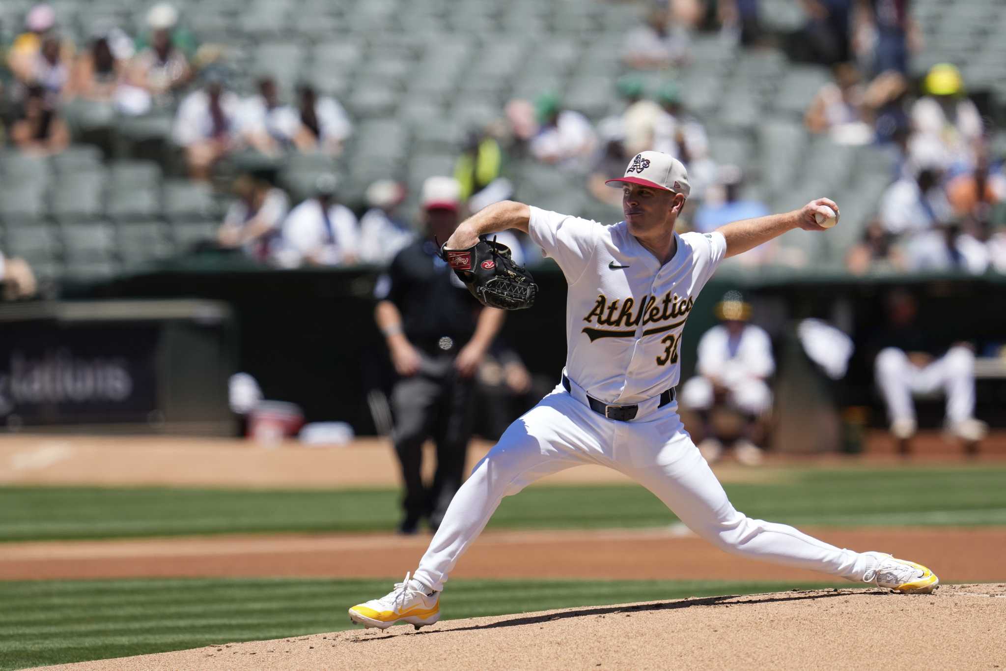 Butler homers, Sears pitches A's to series sweep of Angels with 5-0 win