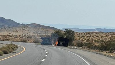 Freeway connecting California to Las Vegas shut down after truck hauling batteries crashes