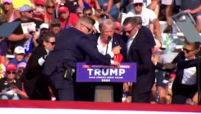 Trump injured in assassination attempt at rally in Butler; 1 attendee, suspected shooter killed