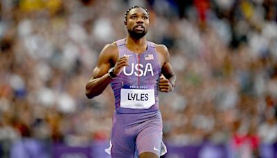 Lyles on to 200m semis in quest for sprint triple