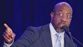 Raphael Warnock delivers a personal address at hometown rally in Savannah, while zinging Herschel Walker as tight race nears: 'We're on a different field today'