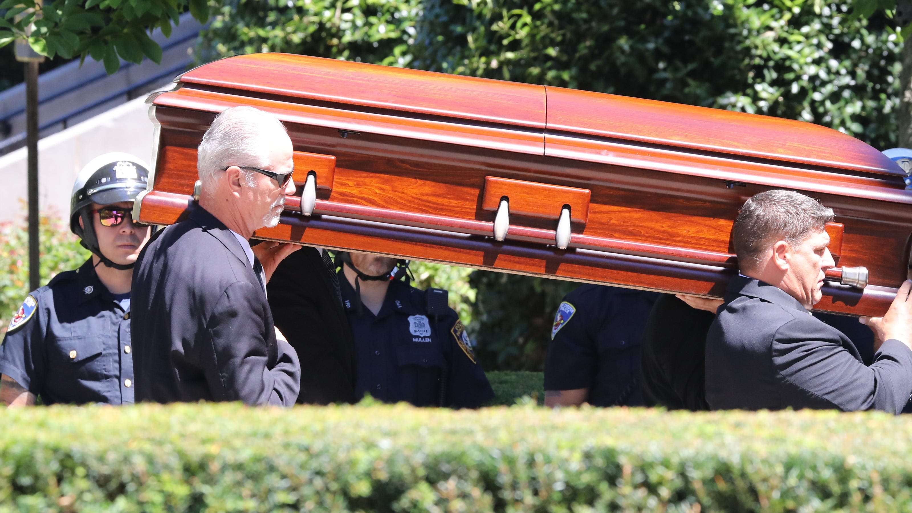 Funeral held for mom and son killed by school bus