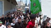 WATCH: Mourners gather for teacher killed in Israeli raid