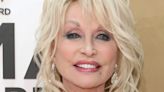 Dolly Parton ditches her classic bouffant hairstyle for a punk rock, festival look