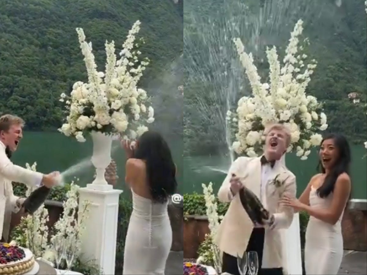 Groom sparks debate after spraying bride with champagne during wedding