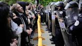 University of Chicago students stage commencement walkout as diplomas withheld