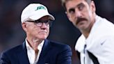 What does Woody Johnson think of Aaron Rodgers possibly entering the political world?