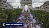 Paris’ Champs-Elysees turned into a massive picnic blanket