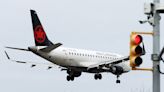 Air Canada reports smaller adjusted loss on business travel rebound