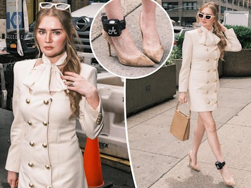 Anna Delvey ‘models’ custom designed Shao New York look, complete with bedazzled ankle monitor, for immigration hearing