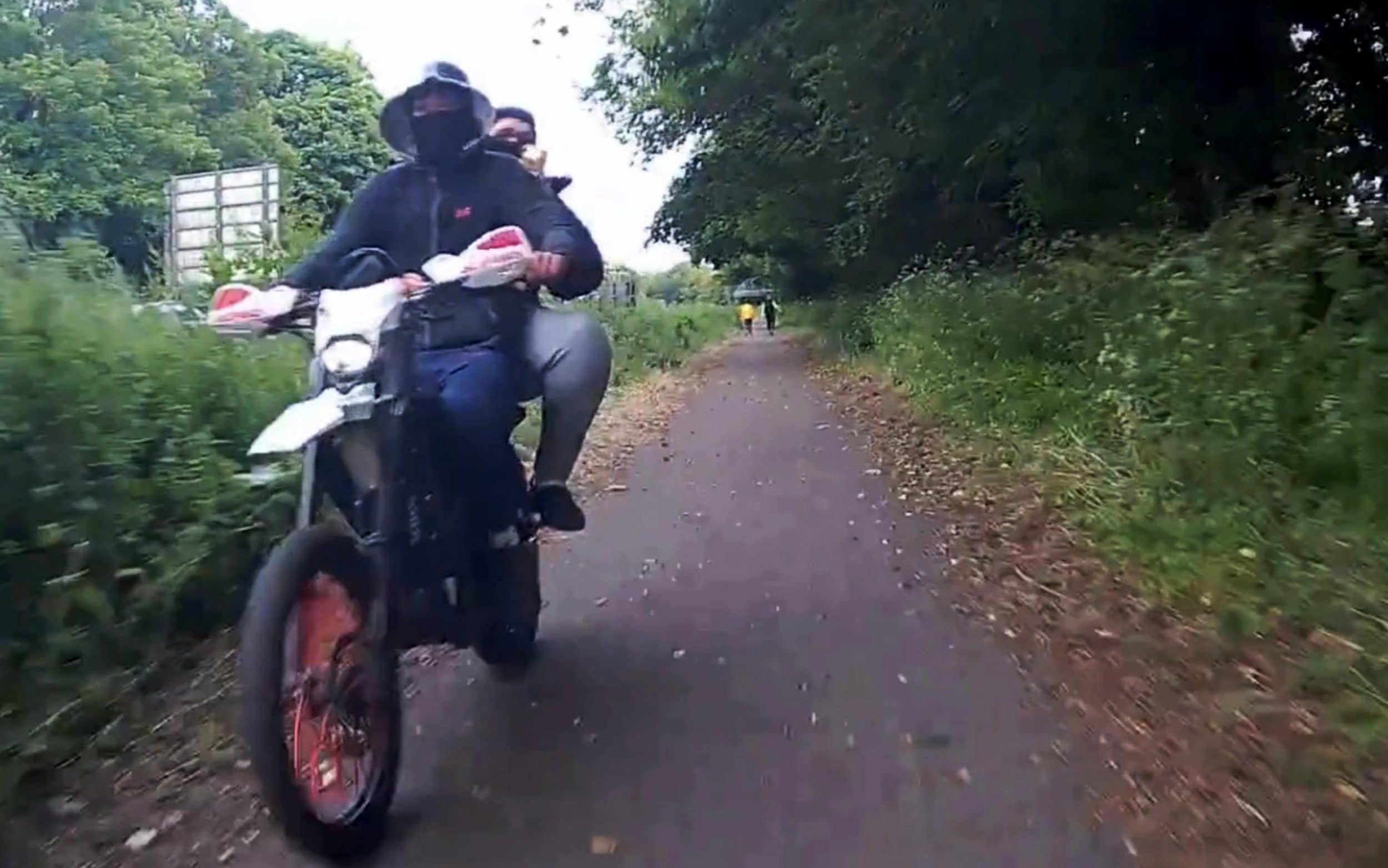 Watch: Cyclist seriously injured after passing biker kicks him to ground