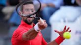 Djokovic wins his opener at the Italian Open after a month off. Defending champ Rybakina withdraws