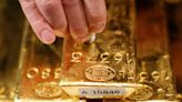 Gold prices rise but pinned below record highs as dollar strength persists By Investing.com