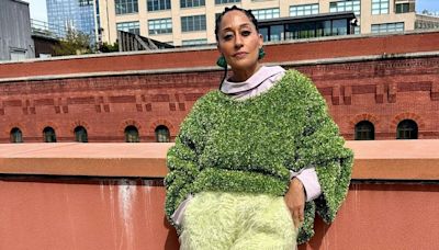 Tracee Ellis Ross Lets Loose in a Grassy Tinsel Sweater and Shaggy Yellow Shorts