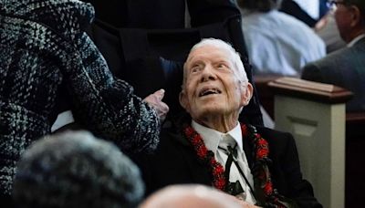 Approaching 100, former President Jimmy Carter "more alert," hoping to vote for Harris