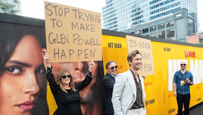 Glen Powell's parents prove comedy runs in the family by 'trolling' him at 'Hit Man' premiere