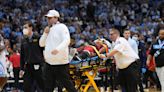 NC State’s Terquavion Smith stretchered off court after hard foul in loss to North Carolina