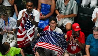 Simone Biles' husband, Jonathan Owens, cheers in the stands as she tries for gold in Paris