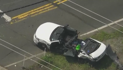 Taxi drove past railroad crossing gates before train hit it on Long Island: MTA