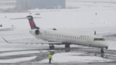 Airlines issue waivers, cancel over 1,000 US flights as winter storm hits the Northeast