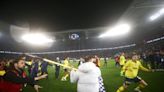 Turkish fans storm pitch to attack Fenerbahce players in horrific mass brawl
