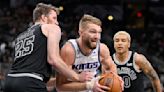 Sabonis' double-double helps Kings power past Spurs 119-109