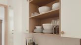 8 tricks for organizing your dishes that professional declutterers always implement in kitchen storage