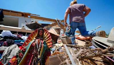 In a north Texas county, dazed residents sift through homes mangled by a tornado