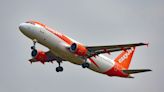 EasyJet cuts losses and insists Britons will not ditch holidays amid cost crisis