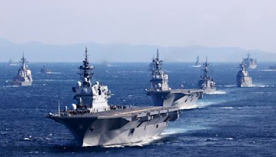 Japan defense chief urges higher security after drone video of warship posted on China social media