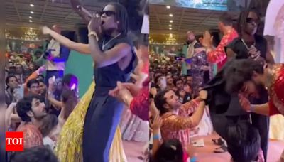 Ibrahim Ali Khan's video of asking for 'Cam Down' singer Rema's jacket during his performance at Anant Ambani, Radhika Merchant's wedding goes viral - WATCH | Hindi Movie News - Times of...