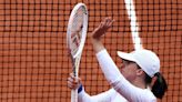 Tennis-Ruthless Swiatek crushes Vondrousova to make French Open semis