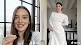 Fans are begging TikTok star Emily Mariko not to cut up her mother's vintage wedding dress to turn it into clutches to gift to her bridal party