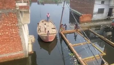 Moradabad residents use boats to commute after heavy rain causes waterlogging