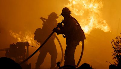 Scenes From the Front Lines as Wildfires Rage in Canada and the West