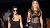 Khloe Kardashian flashes her bra and underwear in a sheer mesh gown