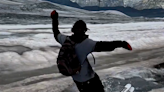 Skiers Ride Melting Glacier In The Summer Sun