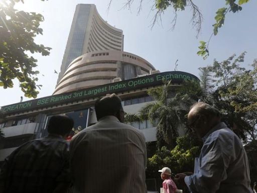 Sensex, Nifty settle flat after hitting fresh all-time highs