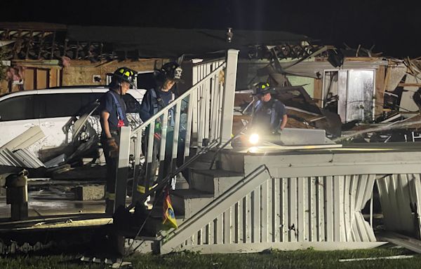 After tornadoes tear through West Michigan, emergency workers search through wreckage