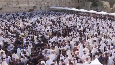 Jewish worshippers gather at Jerusalem's Wailing Wall for traditional priestly blessing