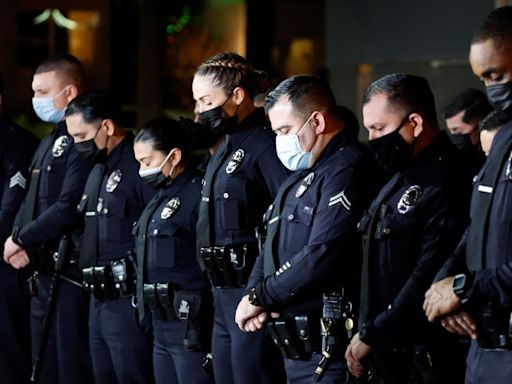 3 alleged gang members and an associate charged in the fatal shooting of an off-duty LAPD officer