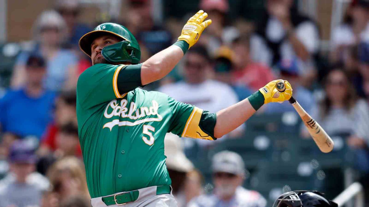 Yankees acquire J.D. Davis from A's, place Giancarlo Stanton on IL