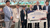 Gwinnett Company Honors Korean War Vets, Donates 20 TVs to Gwinnett Library