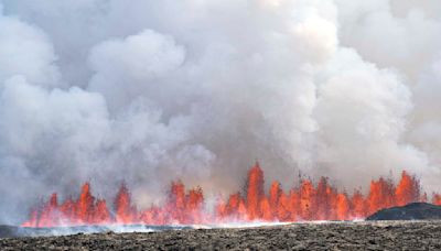 An Iceland volcano starts erupting again, shooting lava into the sky