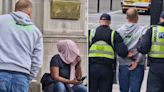 Man swearing at Muslim woman is instantly handcuffed at Tommy Robinson protest