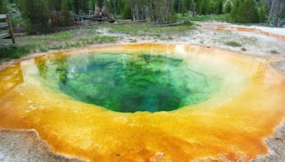 Yellowstone tourists blamed for ruining pristine blue thermal pool