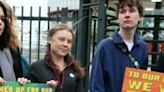 Swedish climate activist Greta Thunberg (centre) said it was 'only the beginning of climate litigation'