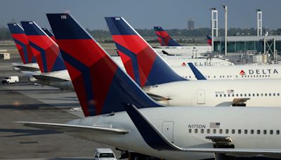 Delta Air Lines grapples with flight cancelations after tech outage