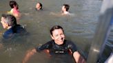 Paris Mayor Anne Hidalgo fulfills Olympic pledge by swimming in river Seine